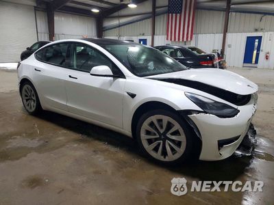 Czwarte zdjęcie samochodu z boku: 2021 TESLA MODEL 3 VIN:5YJ3E1EA0MF096645 - miniatura