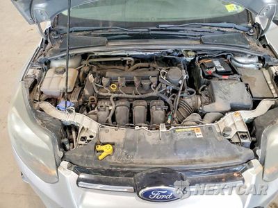 Zdjęcie 11 z 12 samochodu: 2014 FORD FOCUS TITANIUM VIN:1FADP3N28EL257251 - miniatura