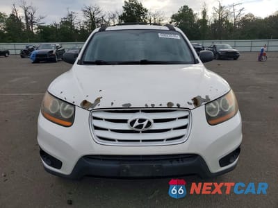 Piąte zdjęcie samochodu w środku: 2010 HYUNDAI SANTA FE GLS VIN:5NMSG3AB5AH389774 - miniatura