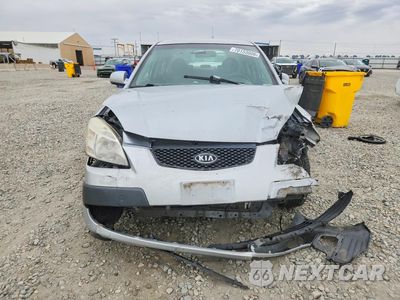 Piąte zdjęcie samochodu w środku: 2009 KIA RIO BASE VIN:KNADE223796495570 - miniatura