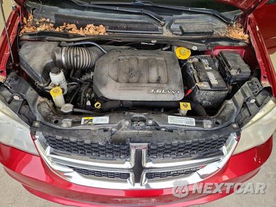 Zdjęcie 12 z 13 samochodu: 2014 DODGE GRAND CARAVAN SE VIN:2C4RDGBGXER411143 - miniatura