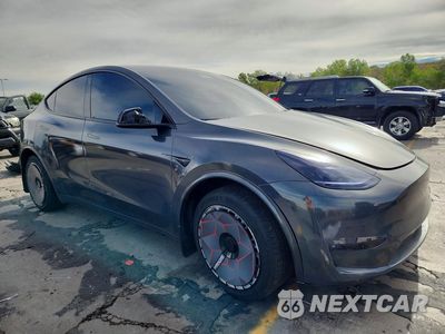 Czwarte zdjęcie samochodu z boku: 2023 TESLA MODEL Y VIN:7SAYGDEEXPF706952 - miniatura