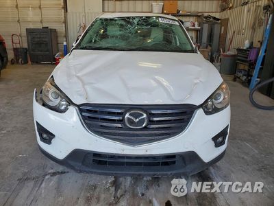 Piąte zdjęcie samochodu w środku: 2016 MAZDA CX-5 GT VIN:JM3KE2DY9G0854234 - miniatura