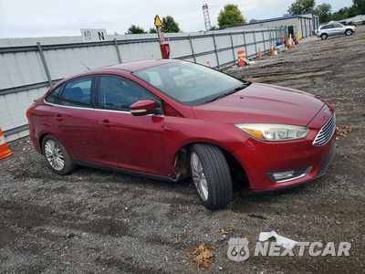 Czwarte zdjęcie samochodu z boku: 2015 FORD FOCUS TITANIUM VIN:1FADP3J24FL273681 - miniatura