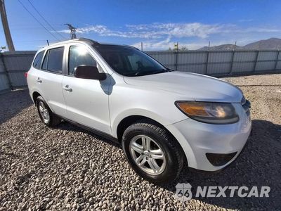 Czwarte zdjęcie samochodu z boku: 2012 HYUNDAI SANTA FE GLS VIN:5XYZGDAB0CG099993 - miniatura