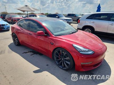Czwarte zdjęcie samochodu z boku: 2020 TESLA MODEL 3 VIN:5YJ3E1EC4LF669594 - miniatura