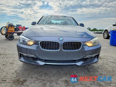 Piąte zdjęcie samochodu w środku: 2013 BMW 328 XI VIN:WBA3B3C52DJ810145 - miniatura