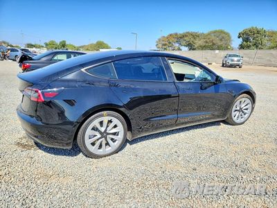 Trzecie zdjęcie samochodu z tyłu: 2021 TESLA MODEL 3 VIN:5YJ3E1EA1MF987852 - miniatura
