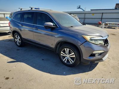 Czwarte zdjęcie samochodu z boku: 2018 HONDA PILOT EXL VIN:5FNYF5H50JB029385 - miniatura