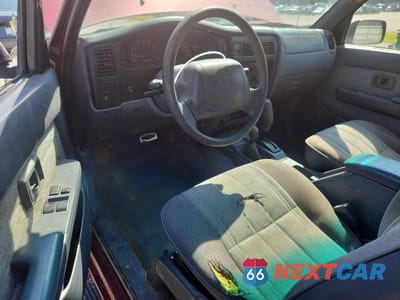 Zdjęcie 8 z 12 samochodu: 1999 TOYOTA TACOMA BASE VIN:4TAWM72N1XZ511542 - miniatura