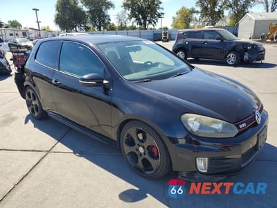 Czwarte zdjęcie samochodu z boku: 2012 VOLKSWAGEN GTI VIN:WVWEV7AJ4CW158821 - miniatura