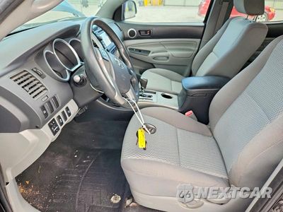 Zdjęcie 7 z 12 samochodu: 2013 TOYOTA TACOMA V6 VIN:3TMLU4EN7DM113900 - miniatura