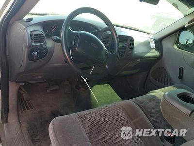 Zdjęcie 8 z 12 samochodu: 2002 FORD F-150 VIN:1FTRF17WX2KC95511 - miniatura