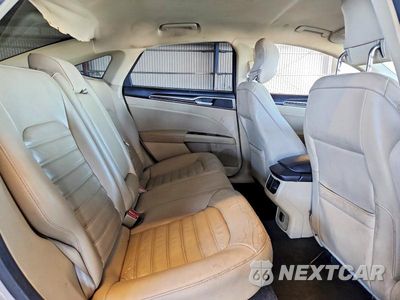 Zdjęcie 10 z 12 samochodu: 2013 FORD FUSION SE HYBRID VIN:3FA6P0LU3DR304536 - miniatura