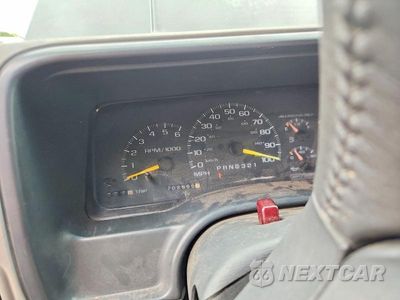Zdjęcie 9 z 13 samochodu: 1999 CHEVROLET TAHOE K1500 VIN:1GNEK13R5XJ322595 - miniatura