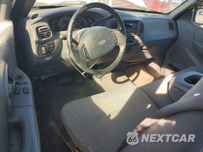 Zdjęcie 8 z 12 samochodu: 2000 FORD F150 VIN:1FTRX17L9YNC27730 - miniatura