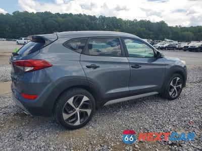 Trzecie zdjęcie samochodu z tyłu: 2017 HYUNDAI TUCSON SPORT VIN:KM8J33A24HU517136 - miniatura