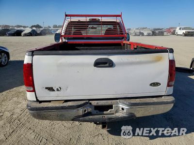 Zdjęcie 6 z 13 samochodu: 2001 FORD F350 SRW SUPER DUTY VIN:1FTSF30FX1EB34239 - miniatura