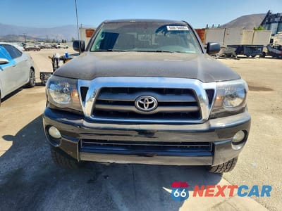 Piąte zdjęcie samochodu w środku: 2009 TOYOTA TACOMA V6 VIN:3TMLU42NX9M023099 - miniatura