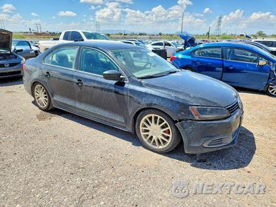 Czwarte zdjęcie samochodu z boku: 2014 VOLKSWAGEN JETTA BASE VIN:3VW2K7AJ5EM408580 - miniatura