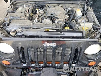Zdjęcie 11 z 13 samochodu: 2012 JEEP WRANGLER UNLIMITED RUBICON VIN:1C4BJWFG4CL215607 - miniatura