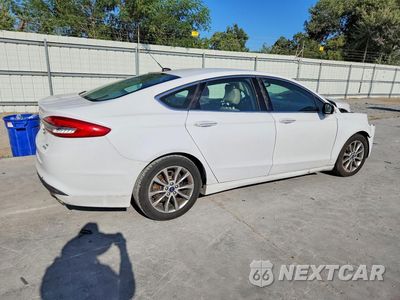 Trzecie zdjęcie samochodu z tyłu: 2017 FORD FUSION SE VIN:3FA6P0HD8HR130767 - miniatura