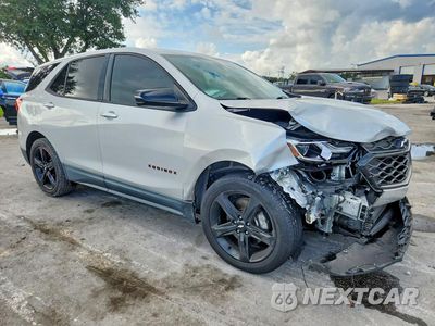 Czwarte zdjęcie samochodu z boku: 2019 CHEVROLET EQUINOX LT VIN:2GNAXLEX4K6177451 - miniatura
