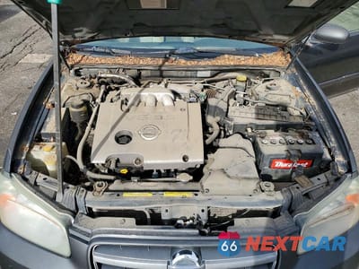 Zdjęcie 11 z 13 samochodu: 2002 NISSAN MAXIMA GXE VIN:JN1DA31D42T430832 - miniatura