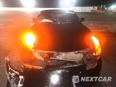 Piąte zdjęcie samochodu w środku: 2004 NISSAN 350Z BASE VIN:JN1AZ34D74M102390 - miniatura