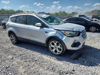 Czwarte zdjęcie samochodu z boku: 2017 FORD ESCAPE TITANIUM VIN:1FMCU0JD6HUA74767 - miniatura