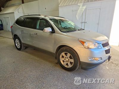 Czwarte zdjęcie samochodu z boku: 2011 CHEVROLET TRAVERSE LT VIN:1GNKVGED9BJ309243 - miniatura