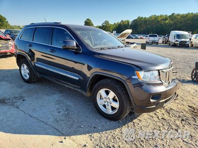 Czwarte zdjęcie samochodu z boku: 2013 JEEP GRAND CHEROKEE LAREDO VIN:1C4RJFAG1DC548306 - miniatura