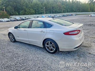 Drugie zdjęcie samochodu z przodu: 2016 FORD FUSION TITANIUM HEV VIN:3FA6P0RU8GR127252 - miniatura