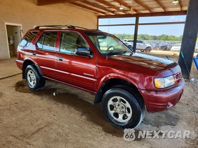 Czwarte zdjęcie samochodu z boku: 2002 ISUZU RODEO S VIN:4S2CK58W824322964 - miniatura
