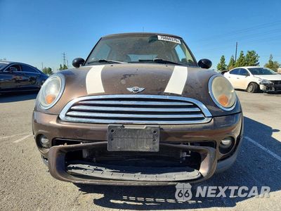Piąte zdjęcie samochodu w środku: 2011 MINI COOPER VIN:WMWSU3C55BTX95924 - miniatura