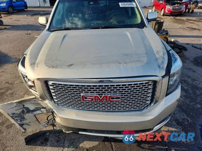 Zdjęcie 12 z 13 samochodu: 2017 GMC YUKON DENALI VIN:1GKS1CKJ9HR233786 - miniatura