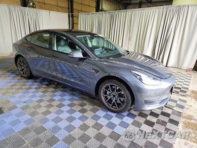 Czwarte zdjęcie samochodu z boku: 2022 TESLA MODEL 3 VIN:5YJ3E1EA1NF286617 - miniatura