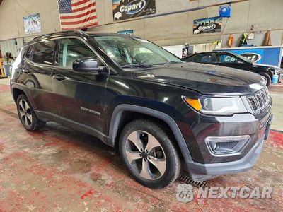 Czwarte zdjęcie samochodu z boku: 2017 JEEP COMPASS LATITUDE VIN:3C4NJDBB2HT655929 - miniatura