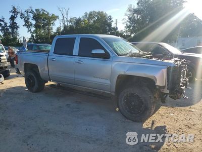 Czwarte zdjęcie samochodu z boku: 2018 CHEVROLET SILVERADO K1500 LT VIN:3GCUKREC5JG479211 - miniatura