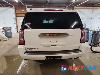 Zdjęcie 6 z 13 samochodu: 2015 GMC YUKON DENALI VIN:1GKS2JKJ4FR639327 - miniatura