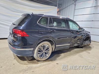Trzecie zdjęcie samochodu z tyłu: 2019 VOLKSWAGEN TIGUAN SE VIN:3VV2B7AXXKM087947 - miniatura