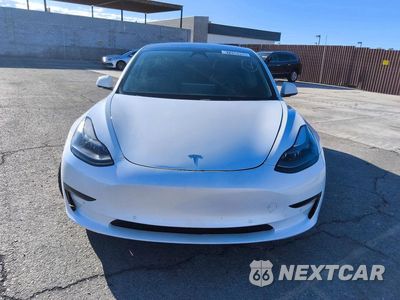 Piąte zdjęcie samochodu w środku: 2021 TESLA MODEL 3 VIN:5YJ3E1EA1MF092300 - miniatura