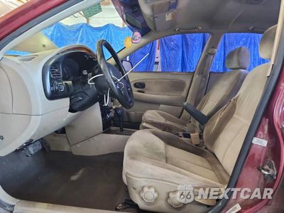 Zdjęcie 7 z 12 samochodu: 2002 KIA SPECTRA BASE VIN:KNAFB121925129082 - miniatura