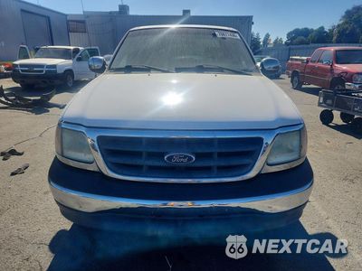 Piąte zdjęcie samochodu w środku: 2002 FORD F150 VIN:1FTRX17L42NA70504 - miniatura
