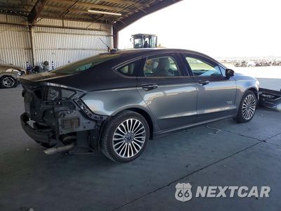 Trzecie zdjęcie samochodu z tyłu: 2017 FORD FUSION SE PHEV VIN:3FA6P0PU5HR258143 - miniatura