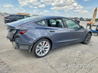 Trzecie zdjęcie samochodu z tyłu: 2023 TESLA MODEL 3 VIN:5YJ3E1EA0PF710498 - miniatura