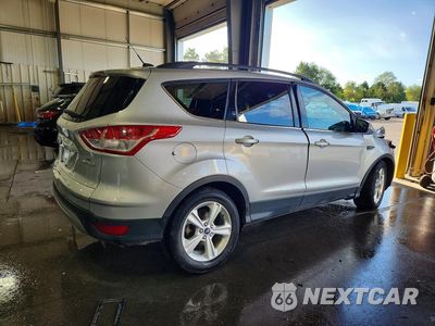 Trzecie zdjęcie samochodu z tyłu: 2014 FORD ESCAPE SE VIN:1FMCU0G94EUE40644 - miniatura