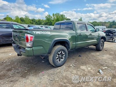 Trzecie zdjęcie samochodu z tyłu: 2021 TOYOTA TACOMA TRD OFF-ROAD VIN:3TMDZ5BN9MM118631 - miniatura