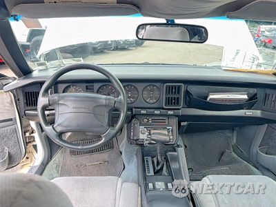 Zdjęcie 9 z 10 samochodu: 1990 PONTIAC FIREBIRD TRANS AM VIN:1G2FW23F6LL218262 - miniatura