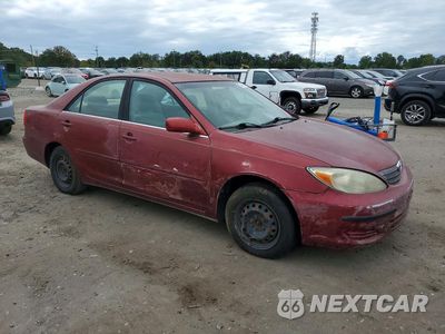 Czwarte zdjęcie samochodu z boku: 2002 TOYOTA CAMRY LE VIN:JTDBE32K620079588 - miniatura